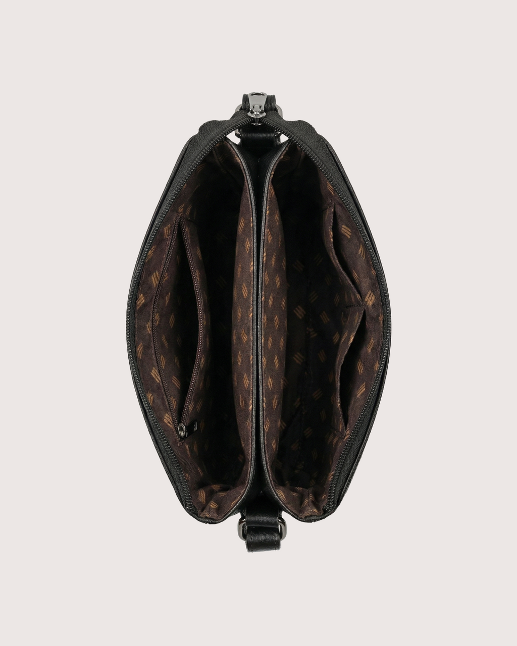 Brown leather bag with visible pattern on a light gray background