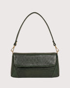 Green croc-embossed shoulder bag with flap closure, structured silhouette, and gold-tone hardware
