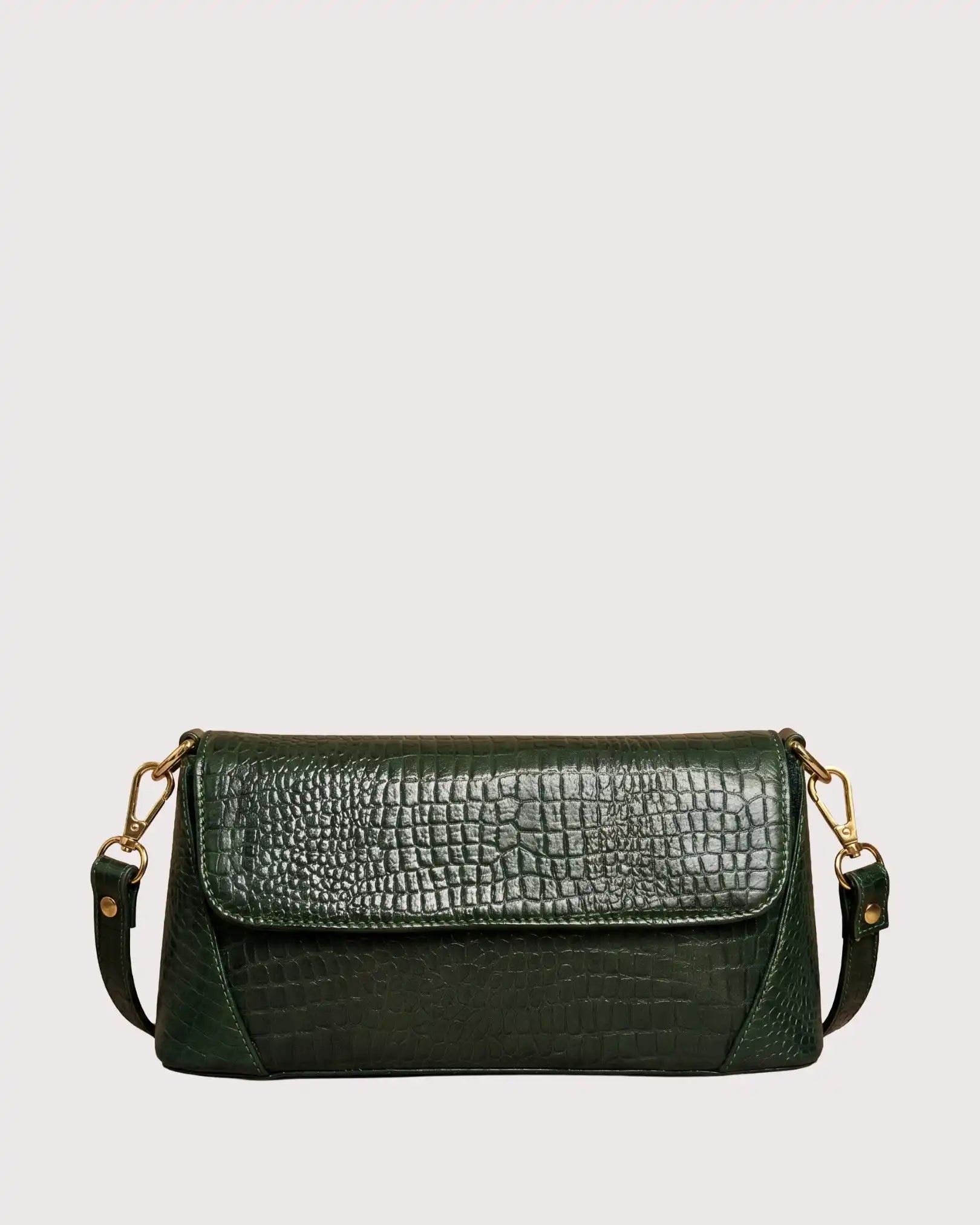 Green croc-embossed shoulder bag with flap closure, structured silhouette, and gold-tone hardware