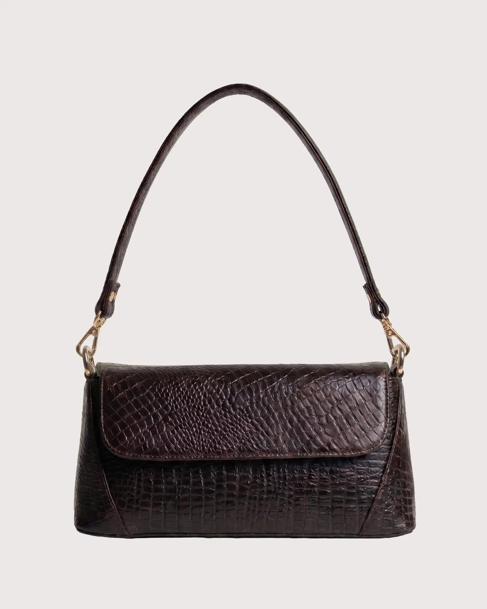 Brown croc-embossed shoulder bag with flap closure, structured silhouette, and gold-tone hardware