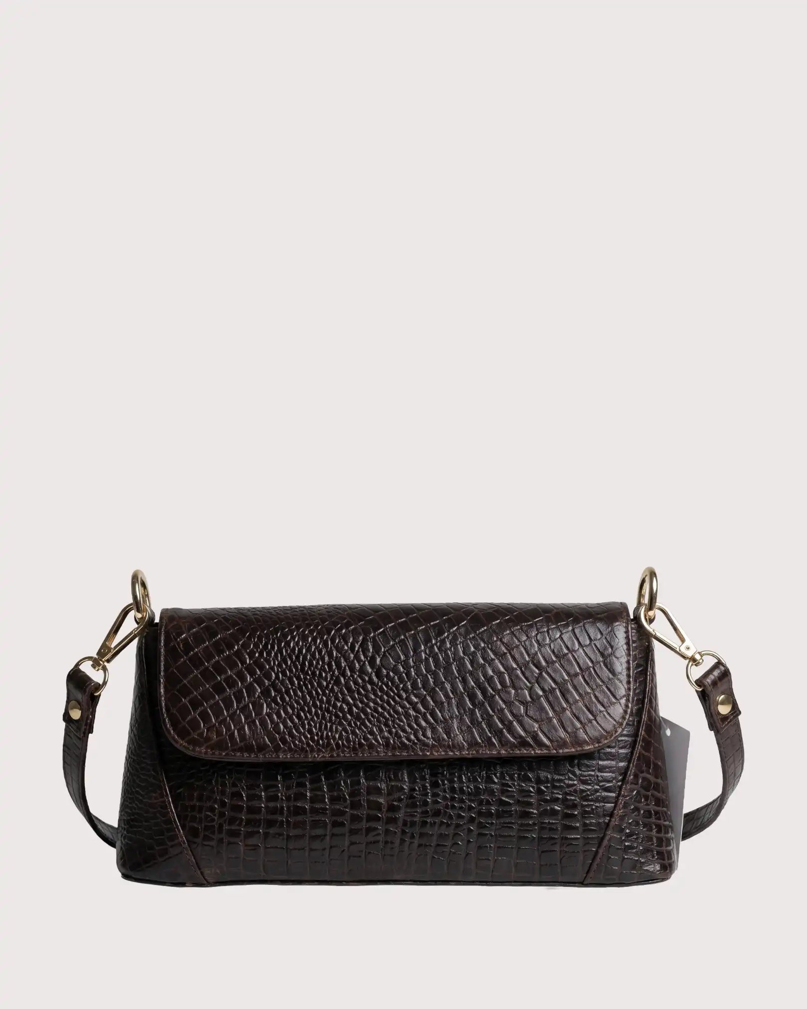Brown croc-embossed shoulder bag with flap closure, structured silhouette, and gold-tone hardware