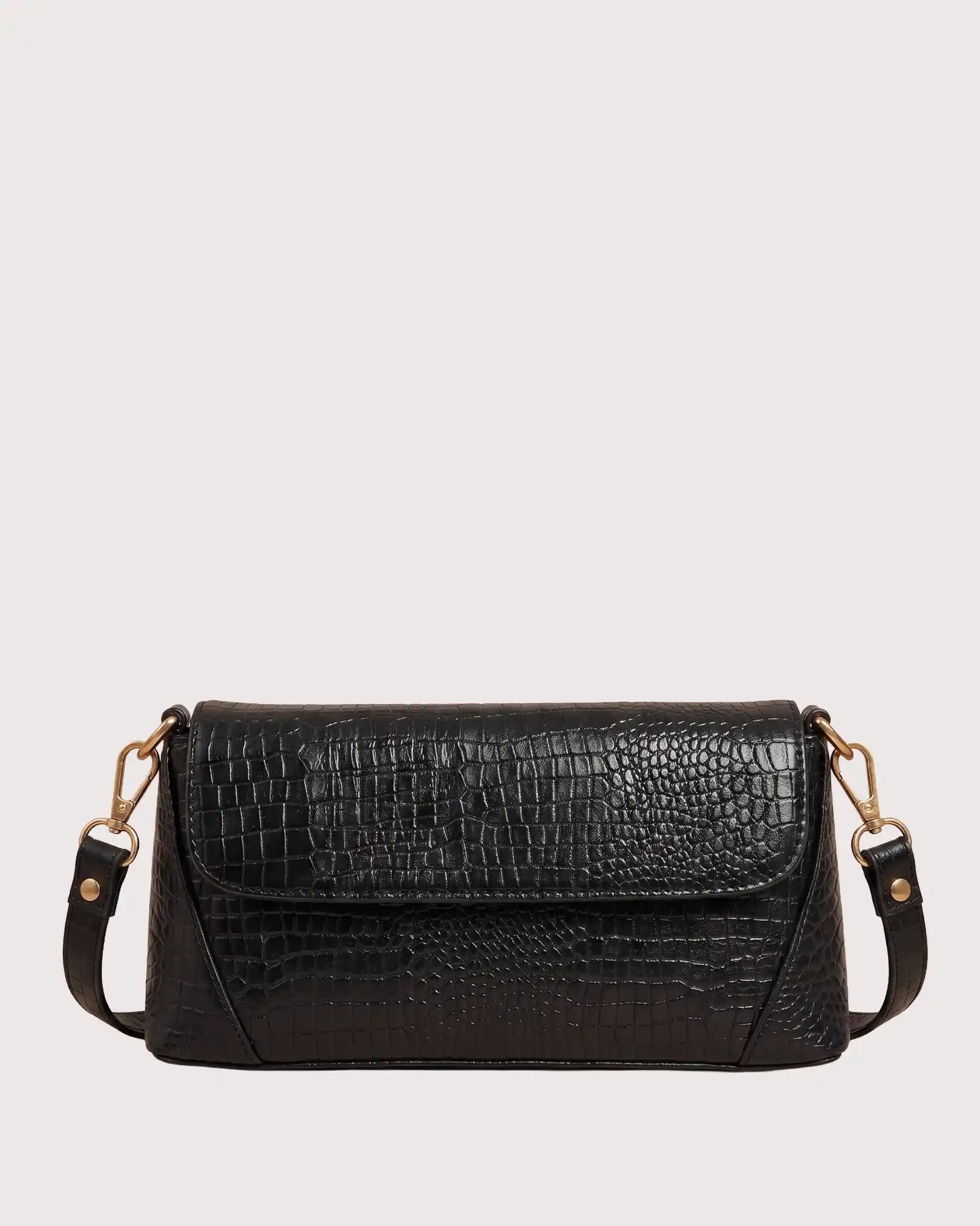 Black croc-embossed shoulder bag with flap closure, structured silhouette, and gold-tone hardware
